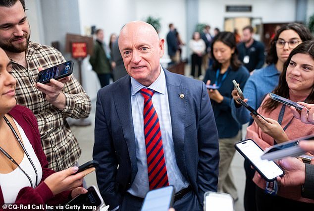 103896061-15291551-Arizona_Democratic_Senator_Mark_Kelly_urged_immigration_official-a-7_1763152636003.jpg