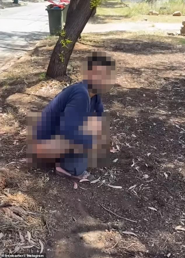 Momento impactante: un australiano se enfrenta a la furia después de que un hombre fue sorprendido usando una calle suburbana como baño a plena luz del día.