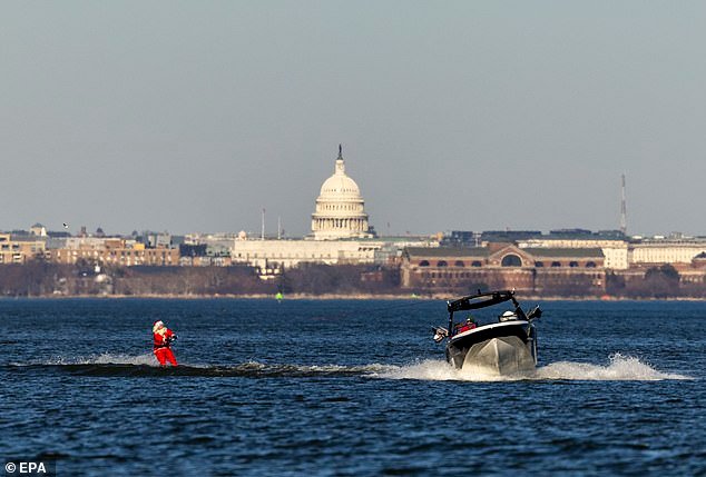 105008555-15411727-Santa_Claus_participates_in_the_Christmas_Eve_Water_Skiing_Santa-a-2_1766674378207.jpg