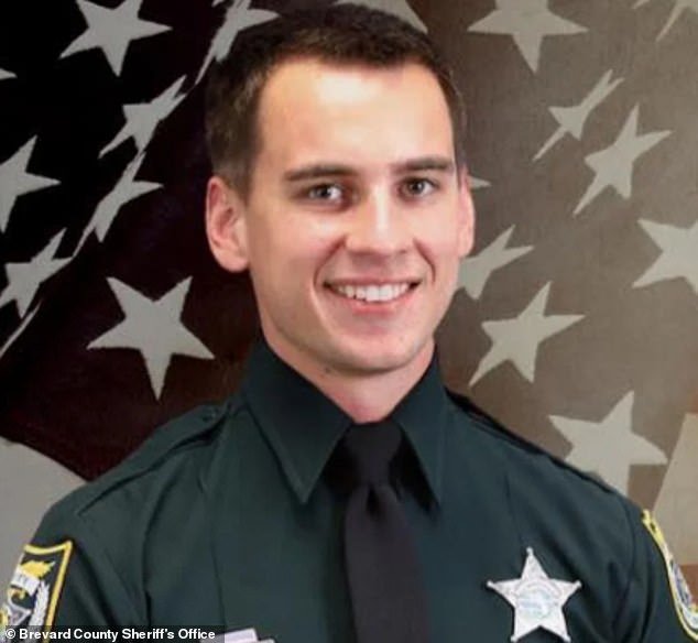105590883-15472121-Austin_Walsh_has_been_a_deputy_with_the_Brevard_County_Sheriff_s-a-16_1768632013361.jpg